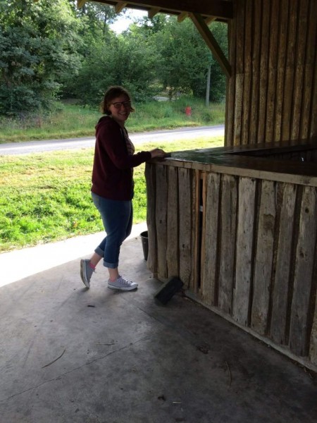 Joanna wiping the bar down.