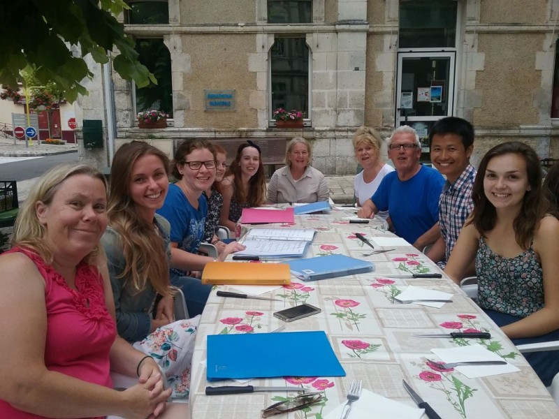 Friends sharing dinner and stories about their weekend jaunts