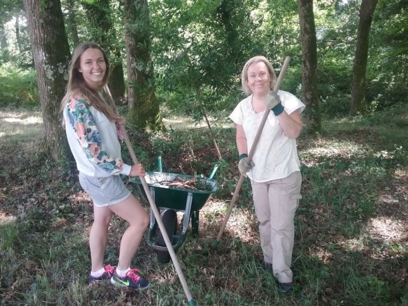 Michelle from Canada and Alina from Russia hard at work on the property.